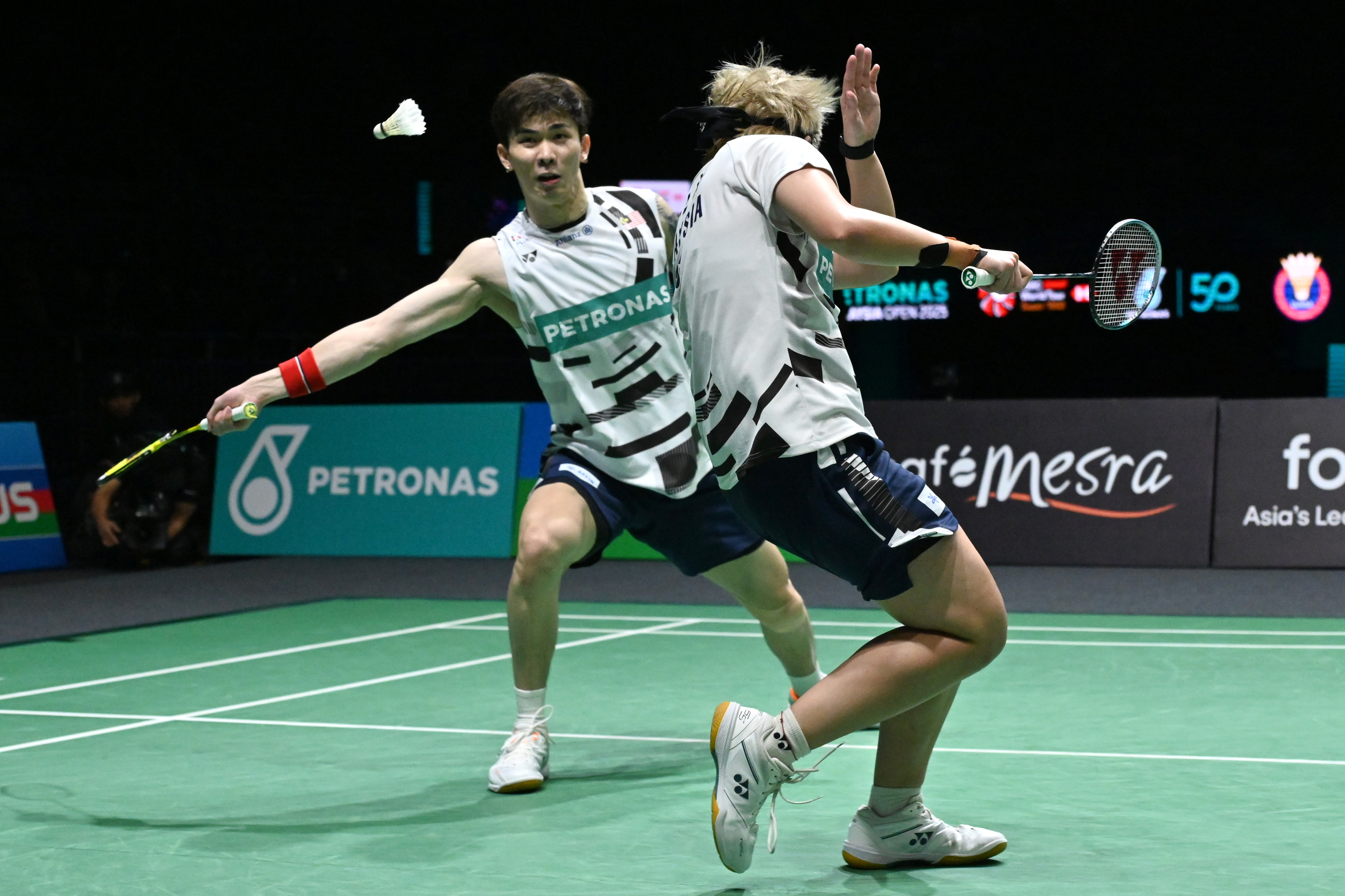 马来西亚羽毛球队鏖战法国羽毛球队，陶菲克高光表现的简单介绍